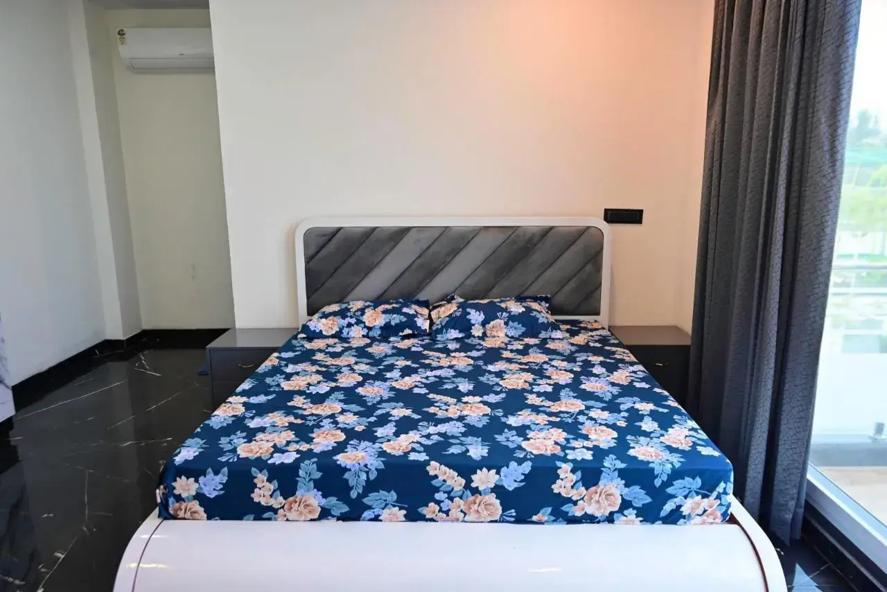 Bedroom with floral linen